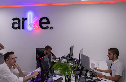 The Arke team working in the office